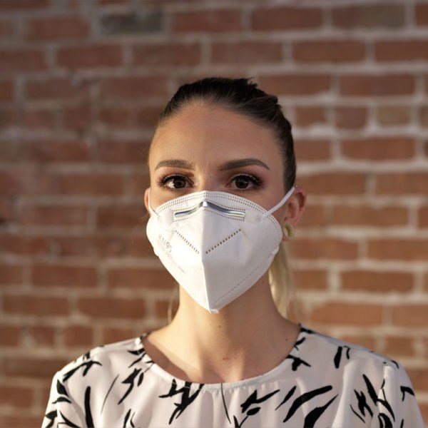Woman wearing KN95 face mask