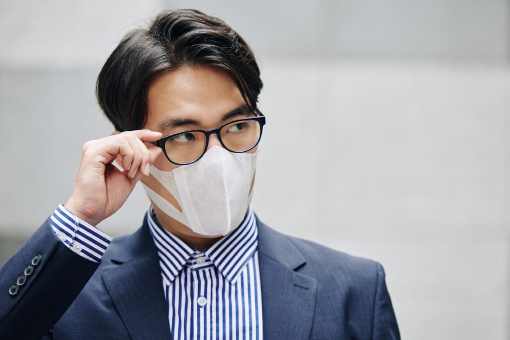 man wearing face mask and glasses